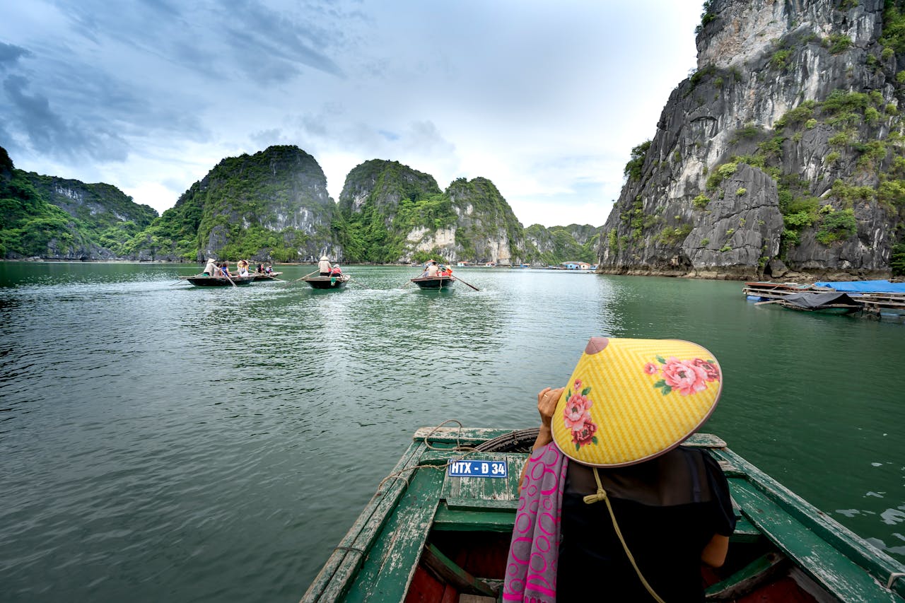 Explore the stunning limestone landscape and boat rides in Ha Long Bay, Vietnam.